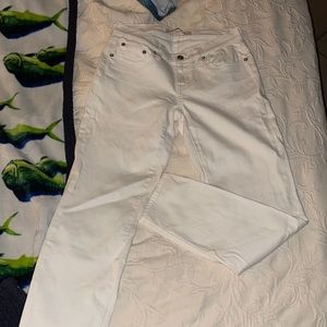 Big Star white mid rise skinny jeans.